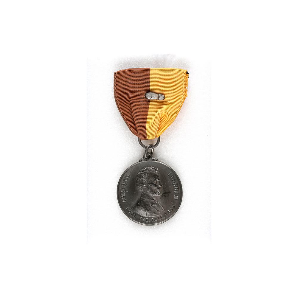 Image: Ribbon with attached Lincoln medallion